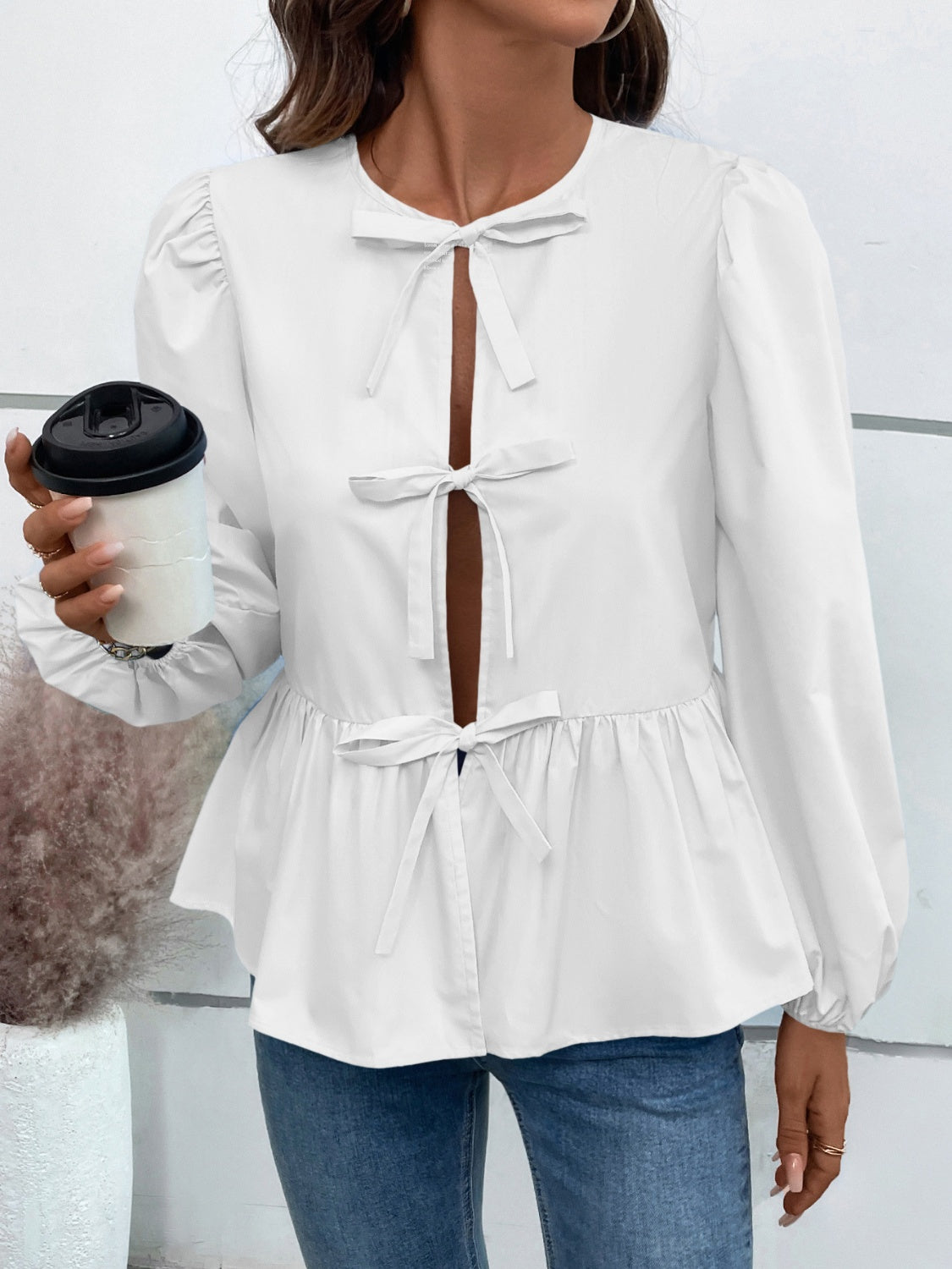 Ivy Lane Peplum Tied Long Sleeve Blouse